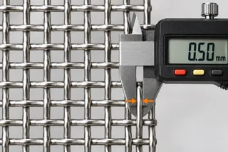 Illustration of a digital caliper measuring 0.50 mm wire diameter