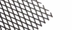 Dark raised expanded metal mesh with angled diamond strands and exposed cut edges