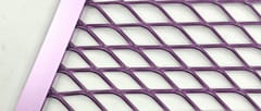 Purple powder coated expanded metal panel showing diamond openings and a framed edge