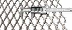 Digital caliper measuring the diamond opening of a raised expanded metal sheet