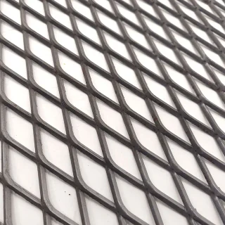Raised carbon steel sheet with angled diamond strands