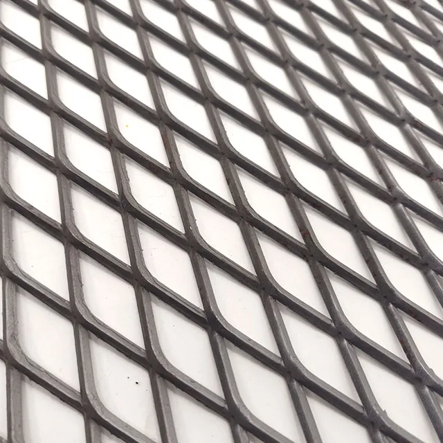 Raised carbon steel mesh with angled diamond strands