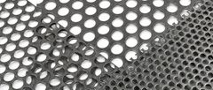 Overlapping carbon steel perforated sheets with different round-hole sizes