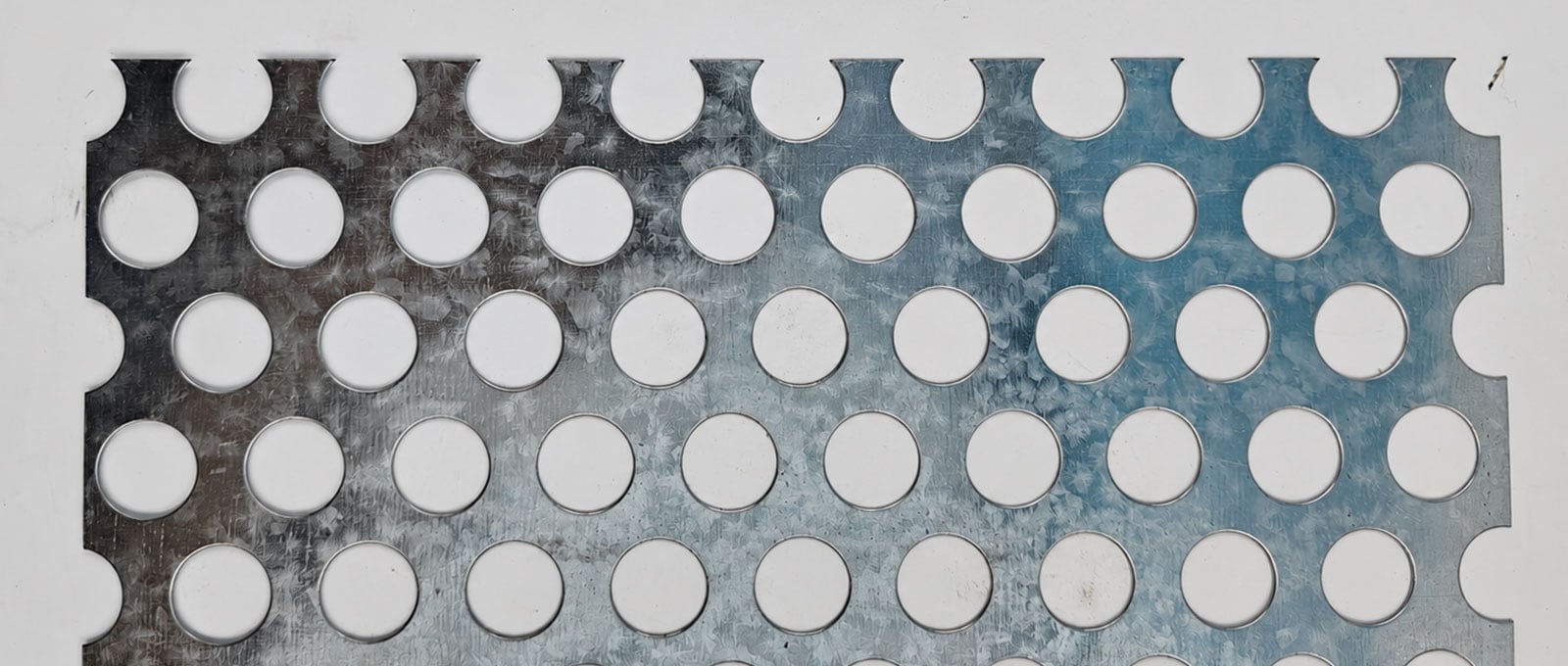 Large round-hole galvanized perforated steel sheet close-up