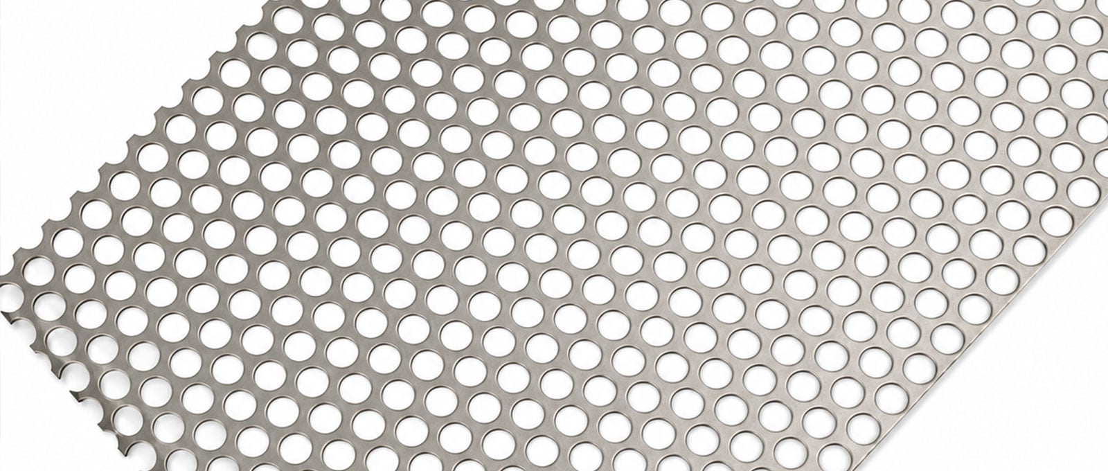 Perforated metal sheet with staggered round holes and panel edge detail