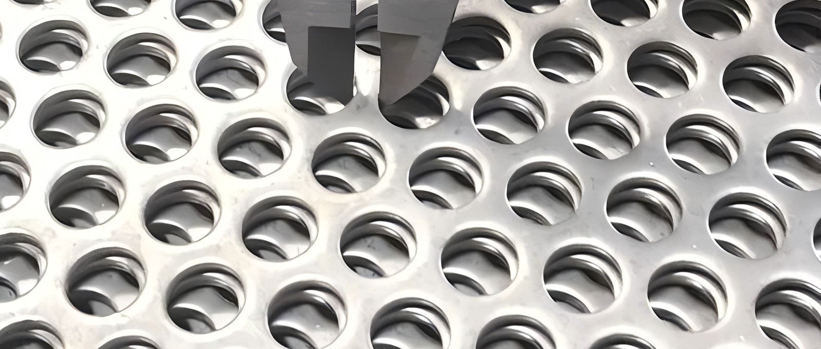 Stainless steel perforated sheet hole measurement with caliper