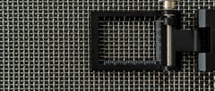 Stainless steel plain weave wire mesh with square openings and a folding inspection magnifier