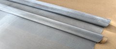 Close-up of rolled 316 stainless steel woven wire mesh with paper cores