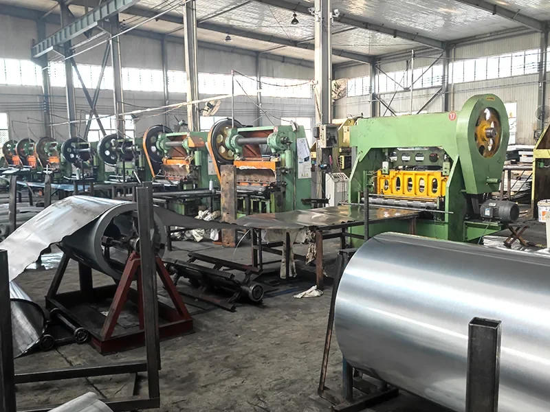 Expanded metal production machines and finished rolls inside the YueChu Metal factory